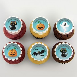 Les cupcakes à motifs d'Halloween fond turquoise